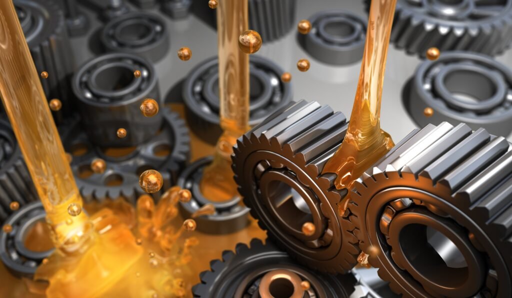 High quality lubrication oil flowing on industrial gears during machine operation